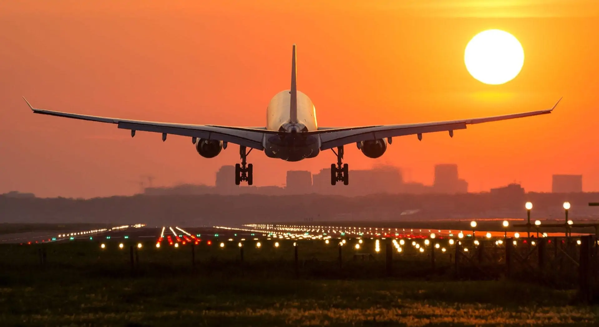 Airplane Taking Off in Sunset